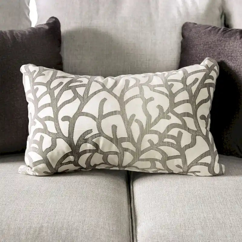 Transitional-style light gray fabric sofa, featuring nailhead trim and throw pillows
