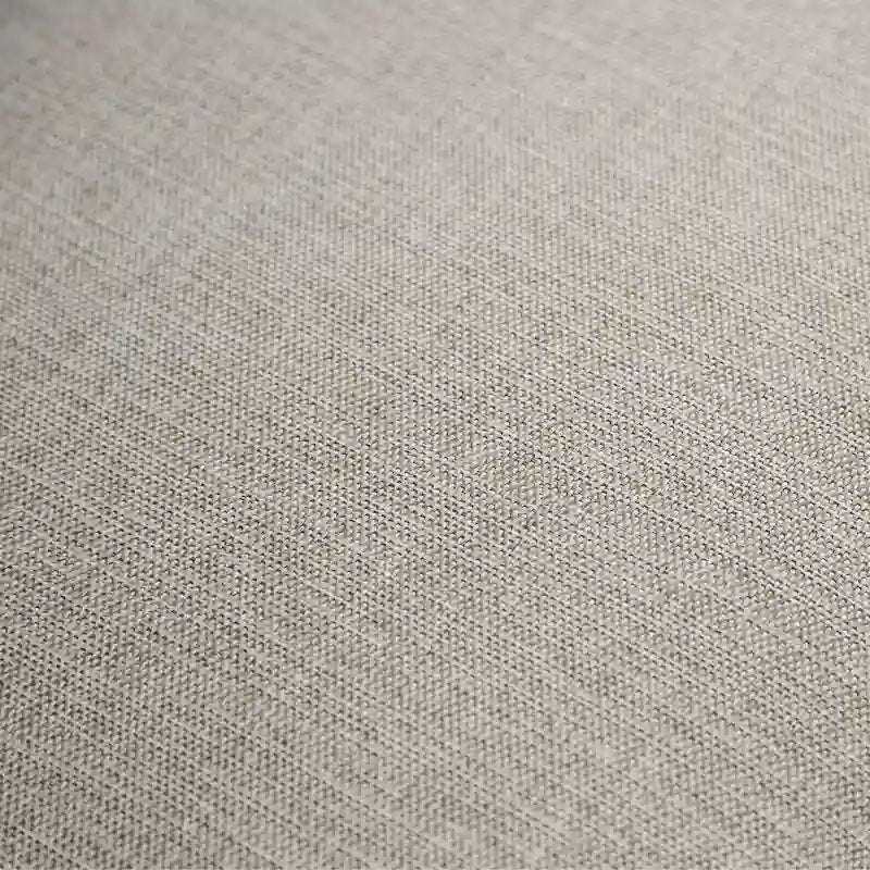 Transitional-style light gray fabric sofa, featuring nailhead trim and throw pillows