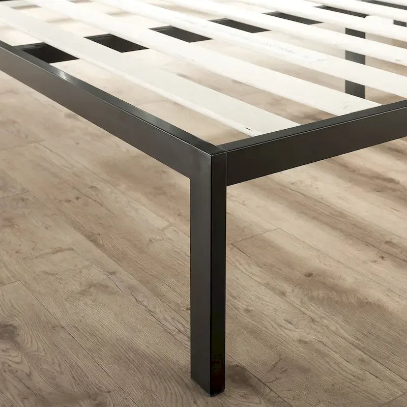 Black steel platform bed frame (with a grey fabric headboard)