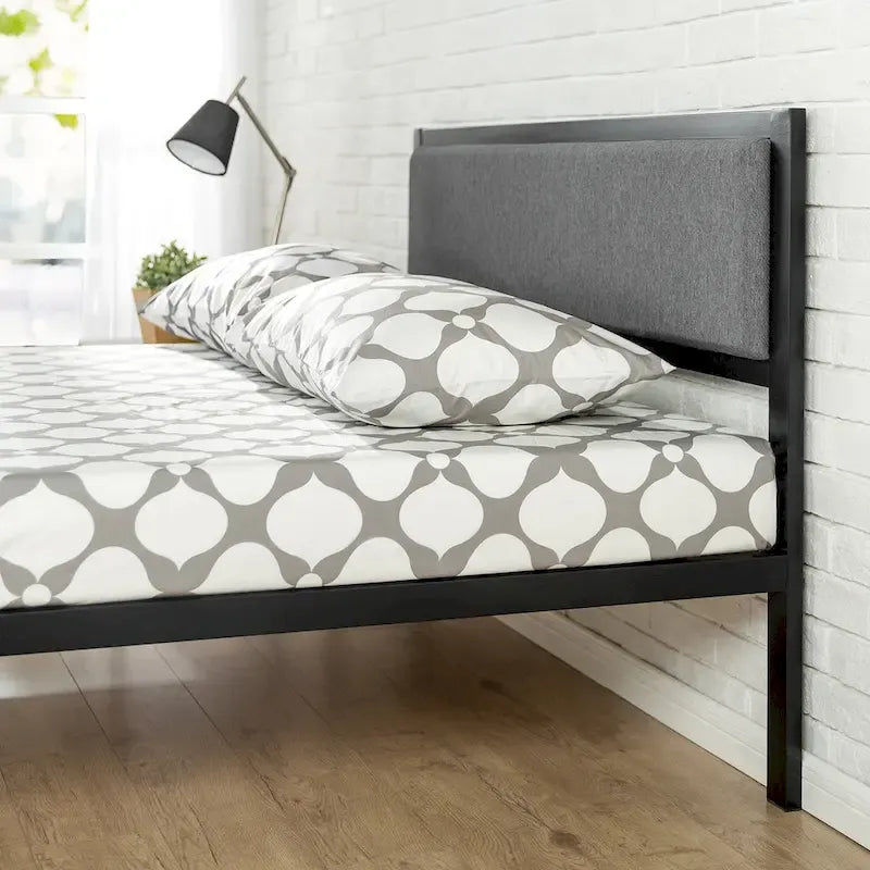 Black steel platform bed frame (with a grey fabric headboard)